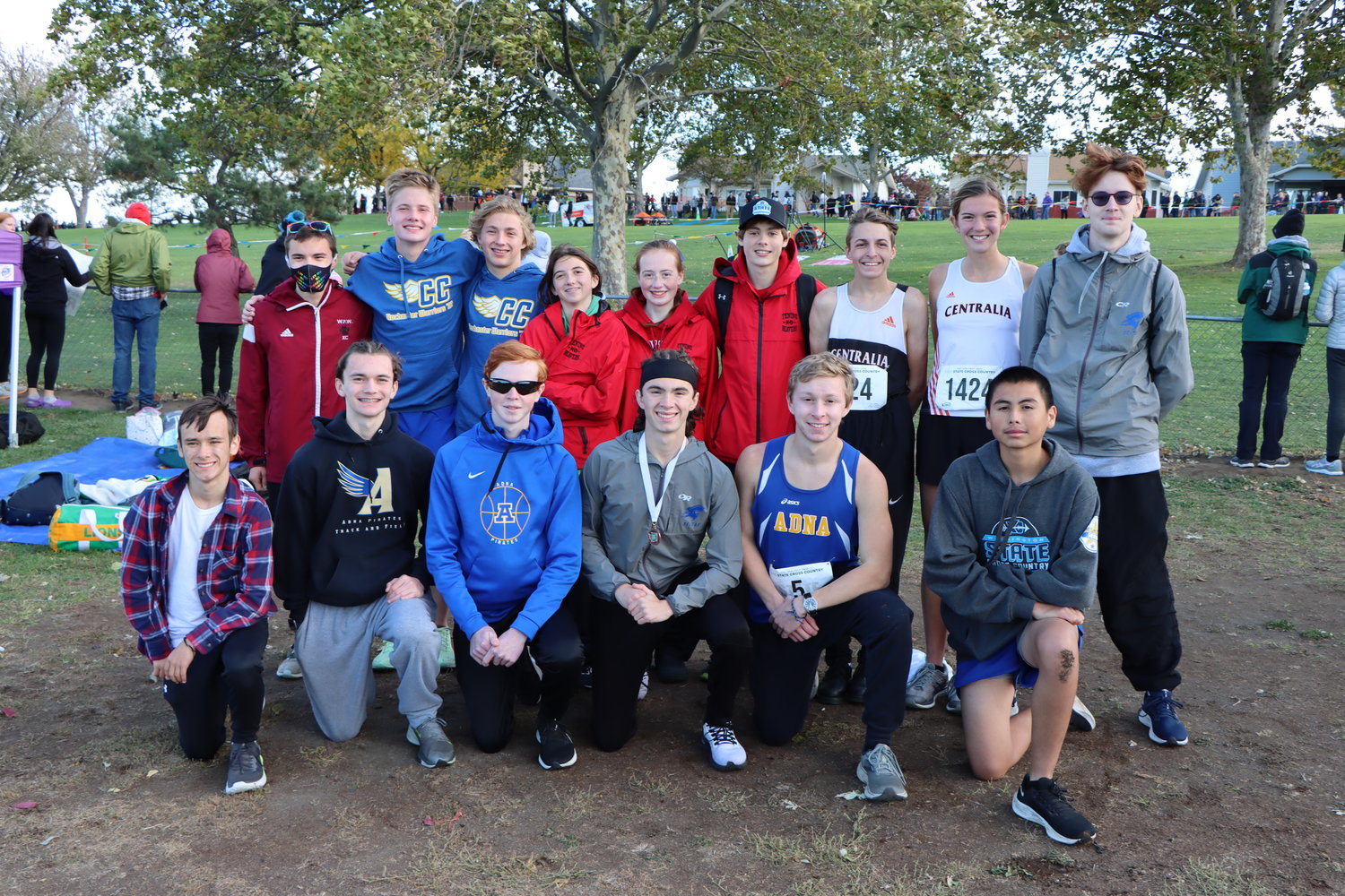 Area runners from local schools pose for a photo at the State Cross Country Championships in Pasco Nov. 5. Front Row from left to right (all from Adna): Davonte Robinson, Kolton Moon, Zane Powell, Jordan Stout, Nate Scheuber and Raul Torres-Rodriguez. Back Row from left to right: Jaysen Miles (W.F. West), Gunnar Morgan (Rochester), Taydee Evenstar (Rochester), Haylee Huber (Tenino), Brynn Williams (Tenino), Tristan VonBargen (Tenino), Devin Harrison (Centralia), Elyse O'Dell (Centralia) and Bailey Davis (Adna).